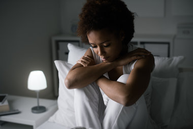 Woman struggling to sleep